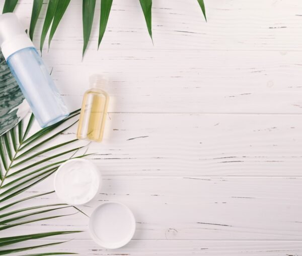 top-view-tropical-leaves-with-beauty-tools-cosmetics top-view-tropical-leaves-with-beauty-tools-cosmetics